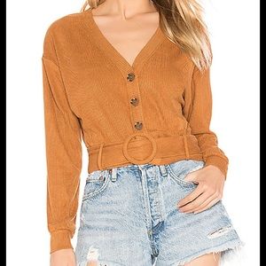 Revolve Button Front Top